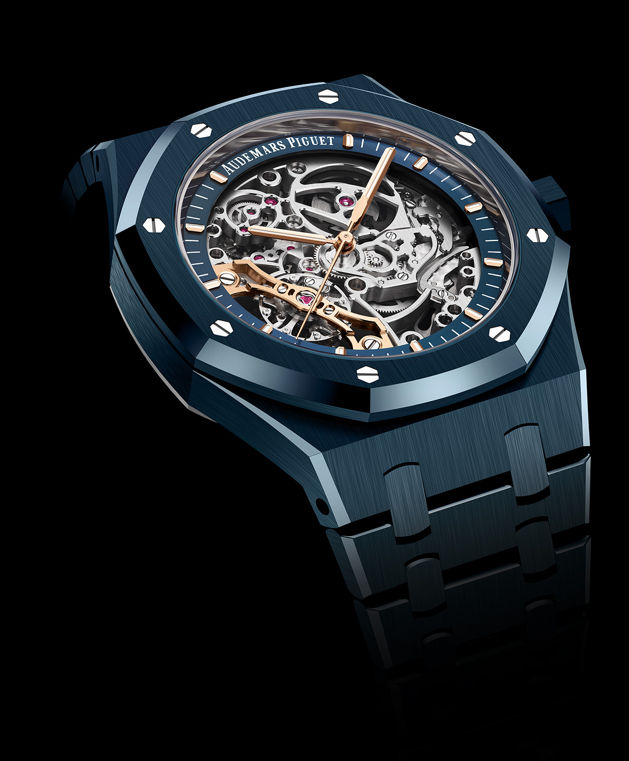 TTPM97_MAIN PHOTO (PLS EXPAND BACKGROUND TO COVER HEADER)_ An openworked dial provides the Royal Oak Double Balance Wheel Openworked in “Bleu Nuit, Nuage 50” ceramic an ethereal quality