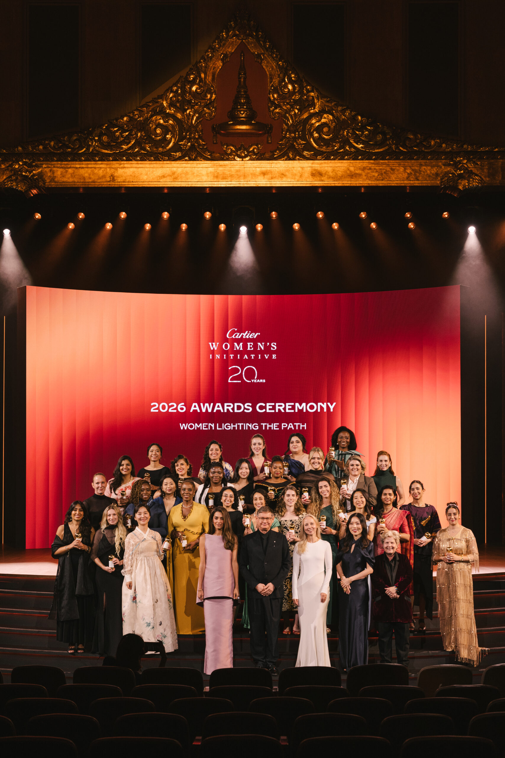 The 2026 Cartier Women’s Initiative fellows, distinguished guests, and Cartier representatives gather on stage at the awards ceremony in Bangkok, celebrating the programme’s 20th anniversary under the theme “Women Lighting the Path.”