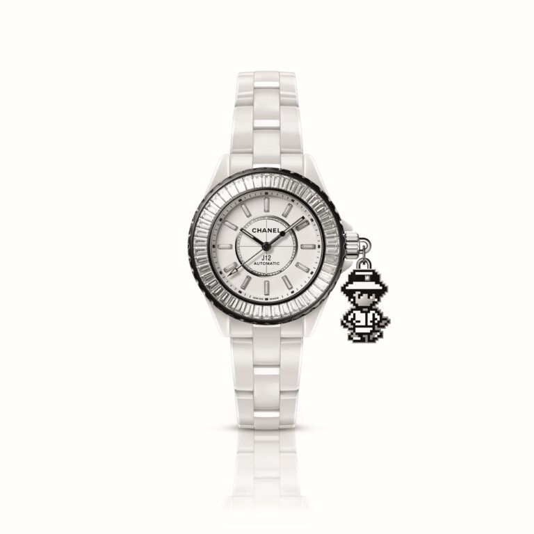 The J12 Coco Game Charms introduces a playful surprise in the form of a dangling charm