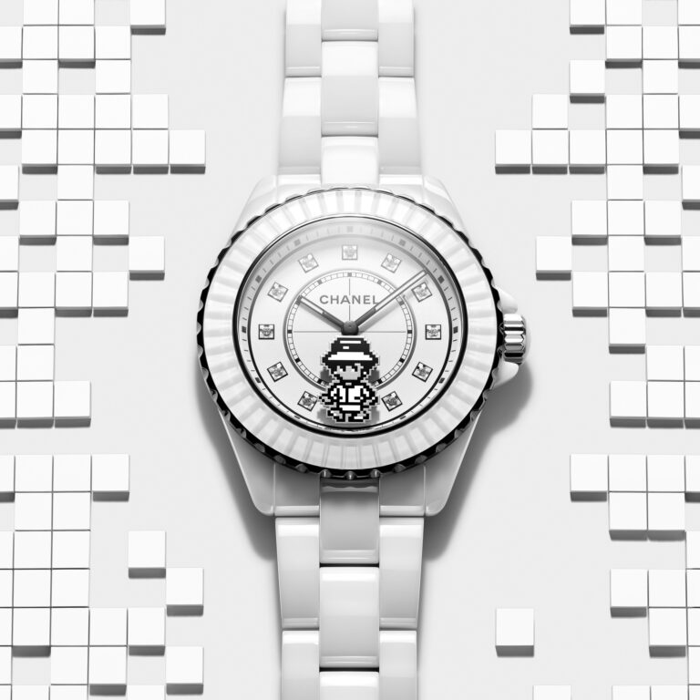 CHANEL showcases its unparalleled creativity with the Coco Game Capsule Collection. Shown here is the J12 Coco Game in matt black ceramic and steel, with brilliant-cut diamond indexes